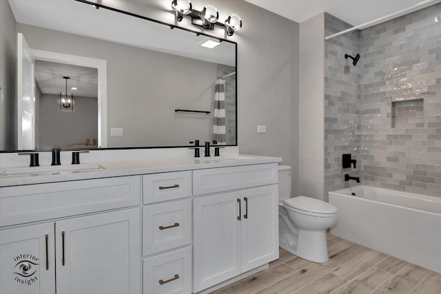 16451 Kayla Dr, Lemont, IL 60439 - full bath with double vanity, wood finished floors, and shower / tub combo
