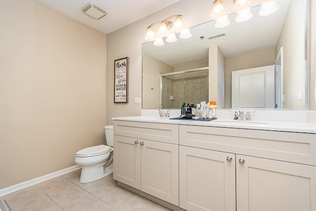 1199 E Port Clinton Rd Unit 305, Vernon Hills, IL 60061 - bathroom with double vanity, a shower stall, and tile patterned flooring