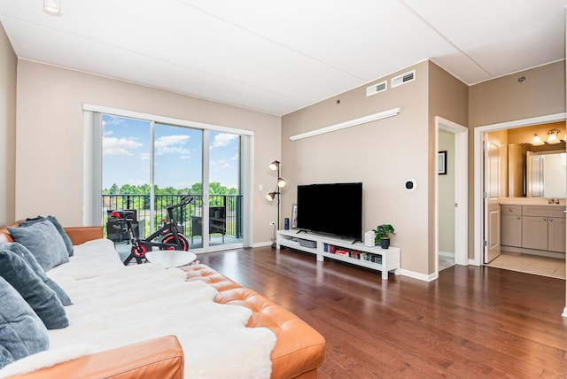 1199 E Port Clinton Rd Unit 305, Vernon Hills, IL 60061 - bedroom featuring access to outside, wood finished floors, and ensuite bath