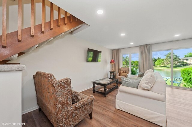 336 Redwing Dr Unit 18-3, Deerfield, IL 60015 - living area featuring recessed lighting, wood finished floors, and stairs