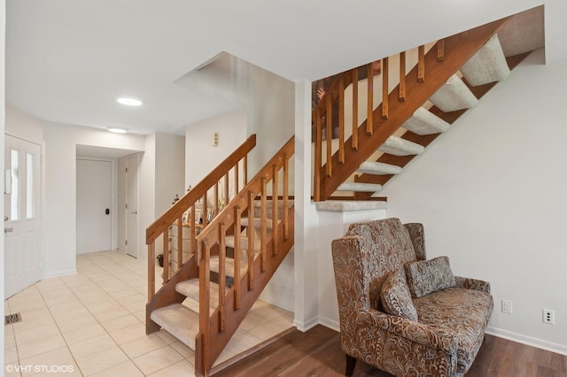 336 Redwing Dr Unit 18-3, Deerfield, IL 60015 - staircase with wood finished floors and recessed lighting