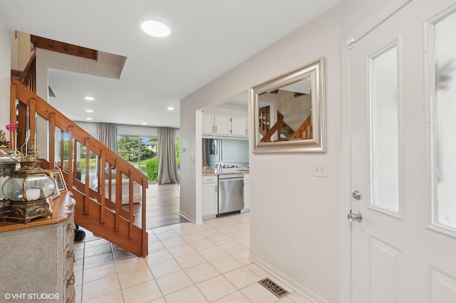 336 Redwing Dr Unit 18-3, Deerfield, IL 60015 - hallway featuring light tile patterned floors, stairs, and recessed lighting