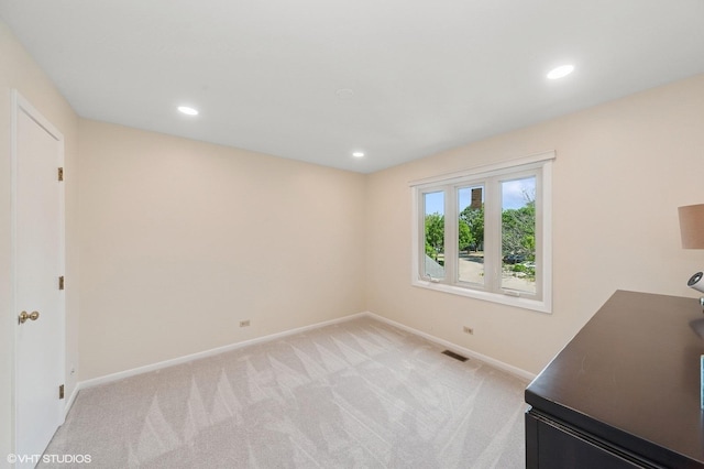336 Redwing Dr Unit 18-3, Deerfield, IL 60015 - unfurnished bedroom featuring light colored carpet and recessed lighting