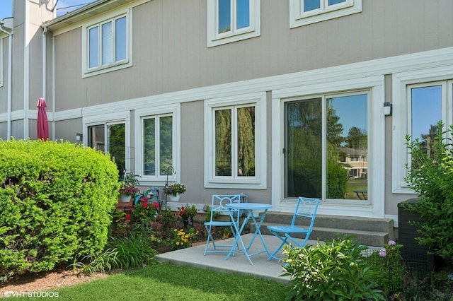 336 Redwing Dr Unit 18-3, Deerfield, IL 60015 - back of house with a patio