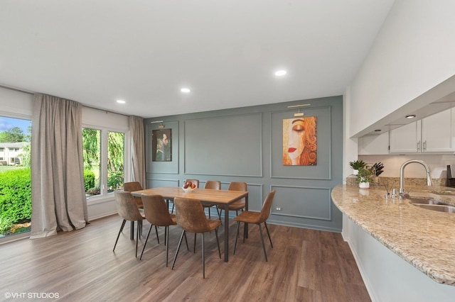 336 Redwing Dr Unit 18-3, Deerfield, IL 60015 - dining room featuring a decorative wall, wood finished floors, and recessed lighting