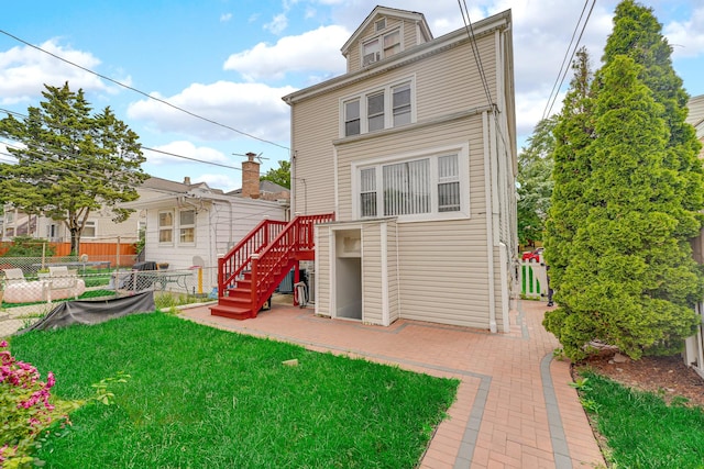 5424 N Lotus Ave, Chicago, IL 60630 - rear view of house featuring a patio