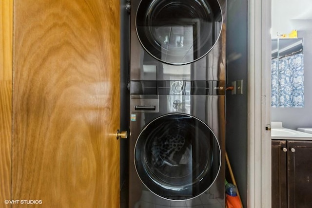 6530 W 94th Pl Unit 2A, Oak Lawn, IL 60453 - washroom with stacked washer / dryer