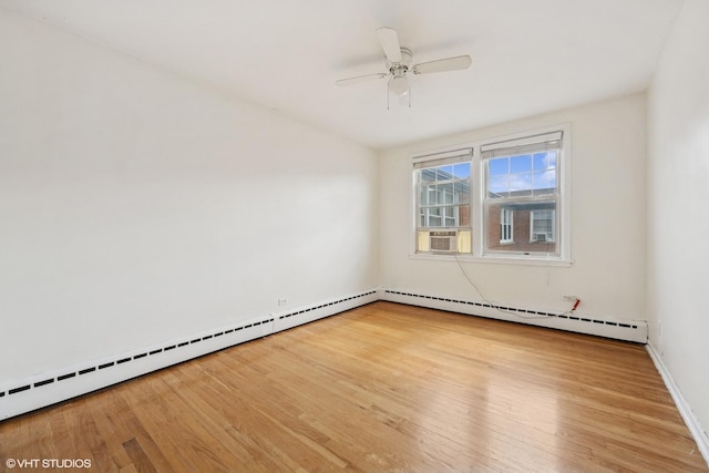 2424 W Farragut Ave Unit 3B, Chicago, IL 60625 - unfurnished room featuring wood finished floors, baseboard heating, a ceiling fan, and cooling unit