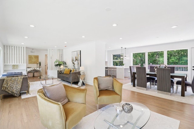 7248 N Kildare Ave, Lincolnwood, IL 60712 - living room with light wood-style flooring and recessed lighting