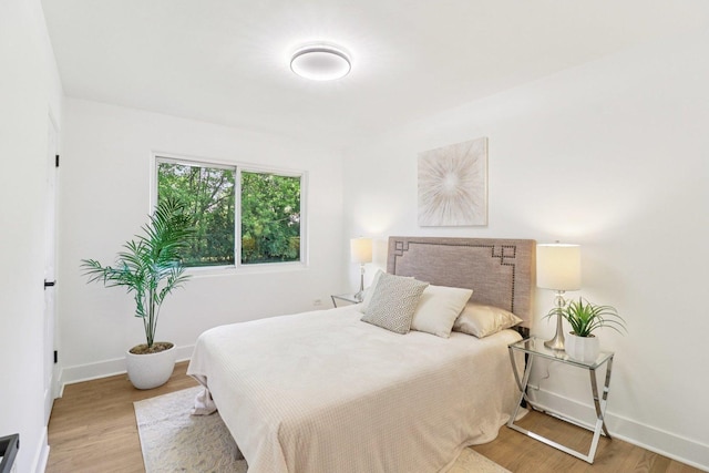 7248 N Kildare Ave, Lincolnwood, IL 60712 - bedroom with wood finished floors and baseboards