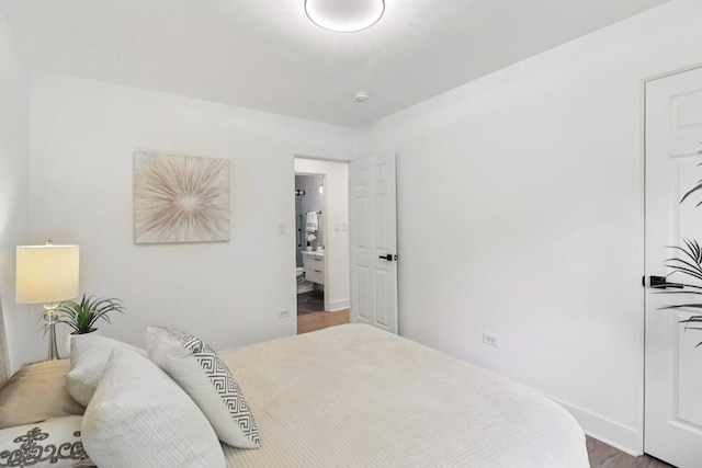 7248 N Kildare Ave, Lincolnwood, IL 60712 - bedroom with baseboards and wood finished floors