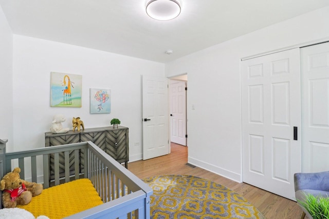 7248 N Kildare Ave, Lincolnwood, IL 60712 - bedroom with wood finished floors and a closet