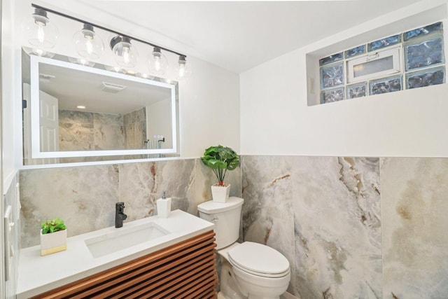 7248 N Kildare Ave, Lincolnwood, IL 60712 - bathroom featuring tile walls and vanity