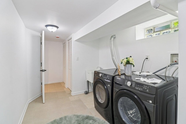 7248 N Kildare Ave, Lincolnwood, IL 60712 - laundry room with separate washer and dryer and light tile patterned floors
