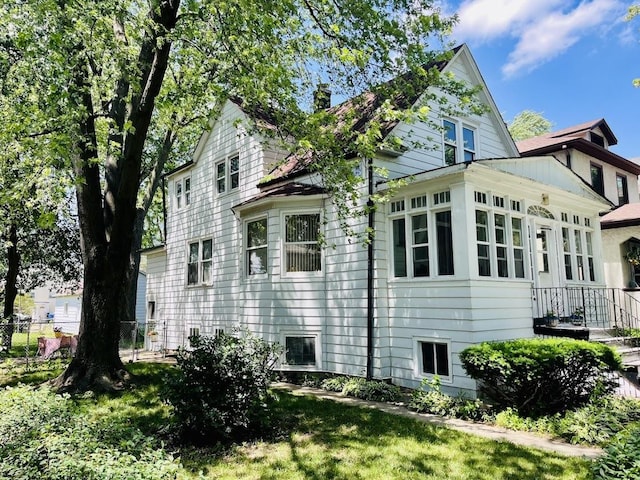 1320 Oak Park Ave, Berwyn, IL 60402 - view of property exterior featuring a chimney