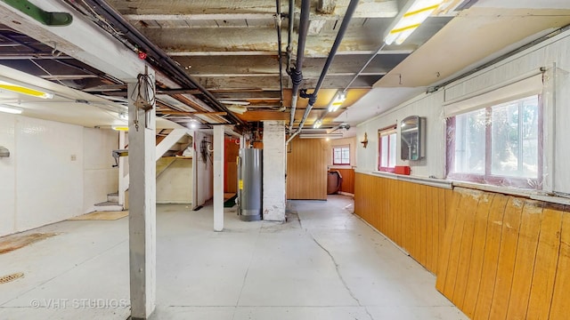1320 Oak Park Ave, Berwyn, IL 60402 - below grade area with water heater, wooden walls, stairs, and washer / dryer