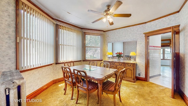 1320 Oak Park Ave, Berwyn, IL 60402 - dining area with ornamental molding, a ceiling fan, light colored carpet, and wallpapered walls