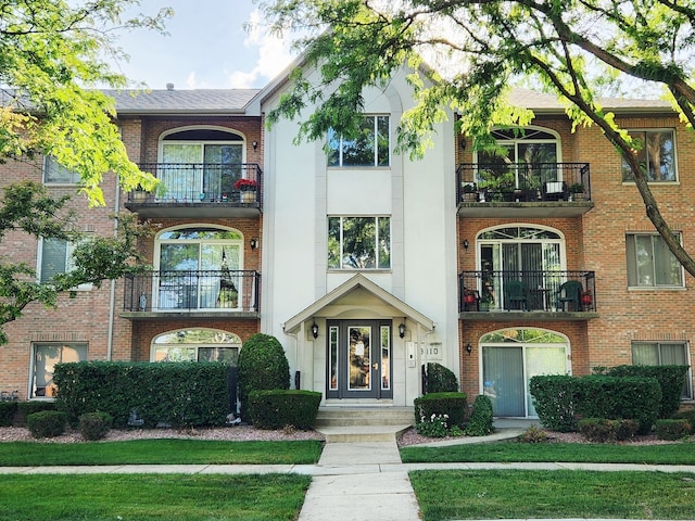 9410 S 77th Ct Unit 3F, Hickory Hills, IL 60457 - view of front facade with a balcony and brick siding