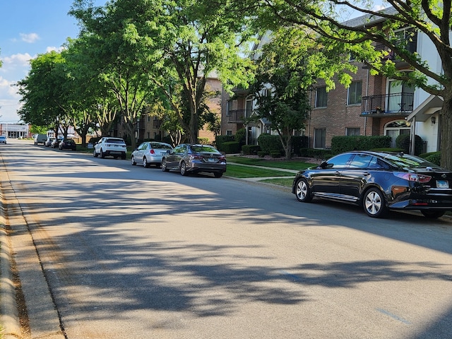 9410 S 77th Ct Unit 3F, Hickory Hills, IL 60457 - view of asphalt street with curbs and sidewalks