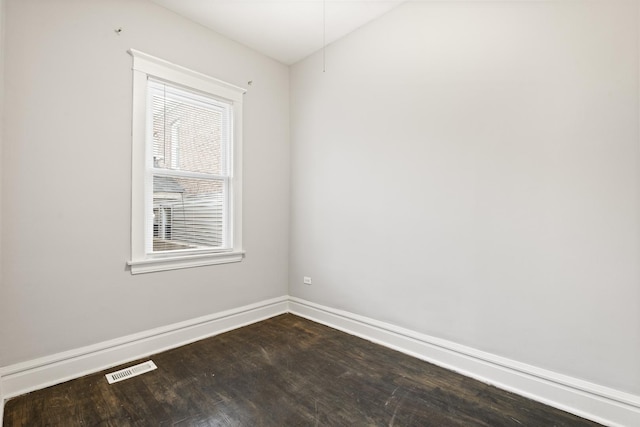 2713 W 24th Pl, Chicago, IL 60608 - unfurnished room with dark wood-style flooring and baseboards