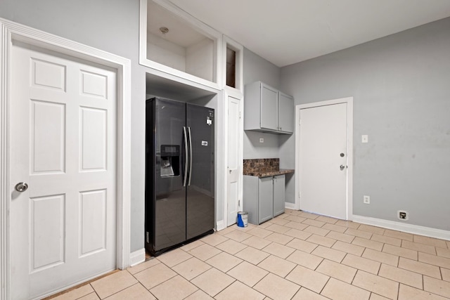 2713 W 24th Pl, Chicago, IL 60608 - kitchen with fridge with ice dispenser, gray cabinets, and dark countertops