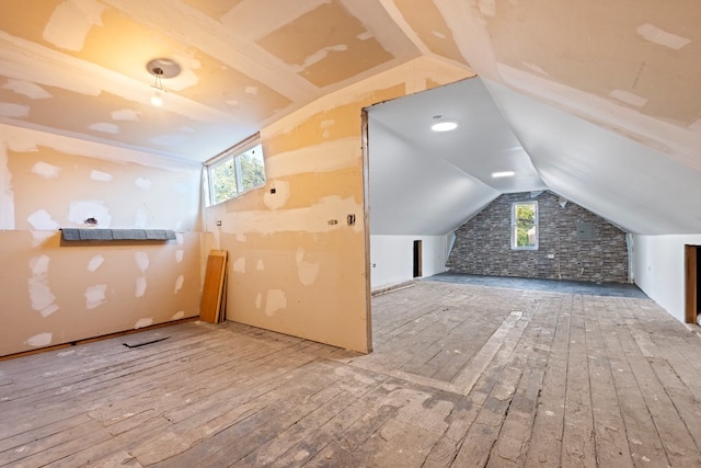 2713 W 24th Pl, Chicago, IL 60608 - bonus room featuring wood-type flooring, lofted ceiling, and plenty of natural light
