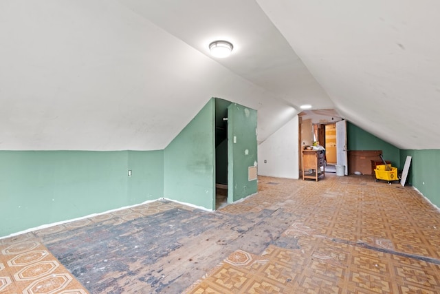 2713 W 24th Pl, Chicago, IL 60608 - additional living space featuring vaulted ceiling and baseboards