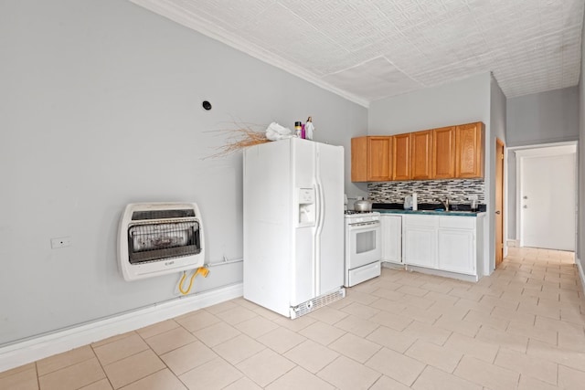 2713 W 24th Pl, Chicago, IL 60608 - kitchen featuring heating unit, white appliances, tasteful backsplash, ornamental molding, and dark countertops