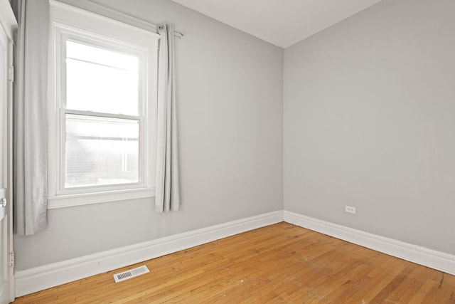 2713 W 24th Pl, Chicago, IL 60608 - empty room featuring wood finished floors and lofted ceiling