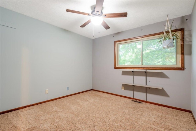 106 Sandra Ln, Normal, IL 61761 - spare room featuring carpet flooring and ceiling fan
