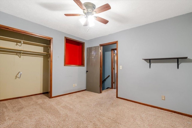 106 Sandra Ln, Normal, IL 61761 - unfurnished bedroom featuring carpet floors, a closet, and ceiling fan