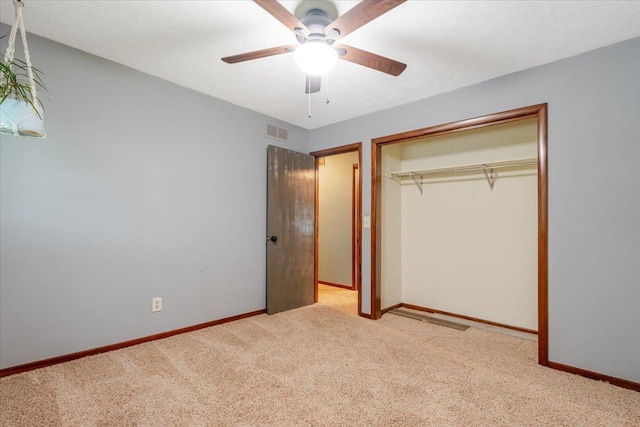 106 Sandra Ln, Normal, IL 61761 - unfurnished bedroom with carpet floors, a closet, and ceiling fan