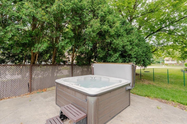 106 Sandra Ln, Normal, IL 61761 - view of patio / terrace with a hot tub