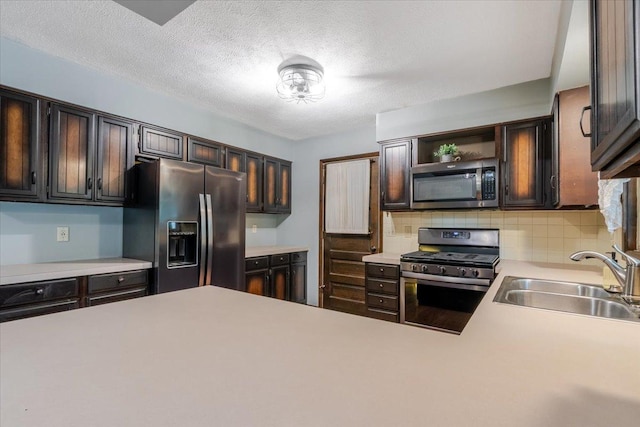 106 Sandra Ln, Normal, IL 61761 - kitchen with appliances with stainless steel finishes, light countertops, open shelves, backsplash, and dark brown cabinets