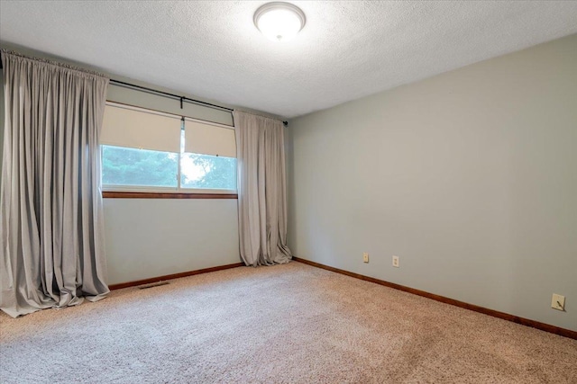 106 Sandra Ln, Normal, IL 61761 - empty room with carpet and a textured ceiling