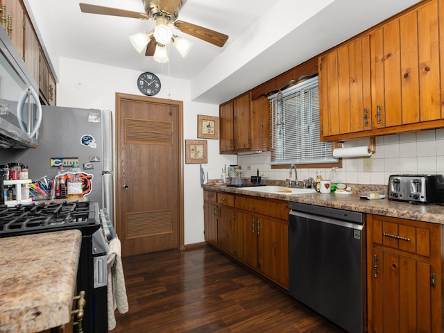 33 E Hickory St Unit A, Lombard, IL 60148 - kitchen featuring appliances with stainless steel finishes, brown cabinetry, decorative backsplash, dark wood finished floors, and ceiling fan
