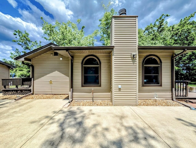 1274 N Cooper Rd, New Lenox, IL 60451 - view of front of property featuring a chimney and a patio