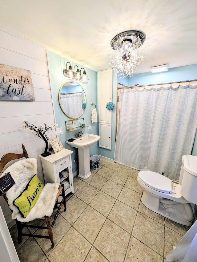 1274 N Cooper Rd, New Lenox, IL 60451 - full bathroom featuring tile patterned floors, a chandelier, wooden walls, and a shower with shower curtain