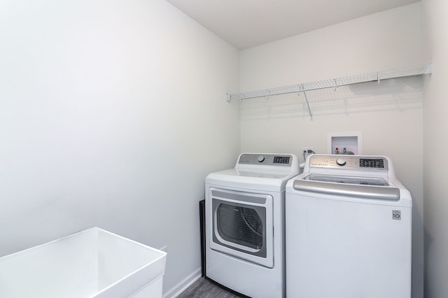 277 Lakeshore Dr, Oswego, IL 60543 - laundry room featuring washer and dryer and dark wood-type flooring