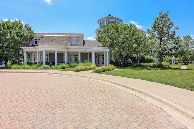 277 Lakeshore Dr, Oswego, IL 60543 - view of front facade with french doors, a front yard, and a shingled roof