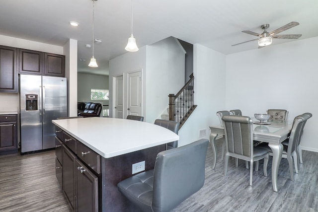 277 Lakeshore Dr, Oswego, IL 60543 - kitchen featuring stainless steel refrigerator with ice dispenser, dark wood-style floors, light countertops, and dark brown cabinets