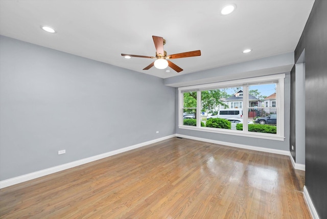 7133 S Honore St, Chicago, IL 60636 - spare room with a ceiling fan, wood finished floors, and recessed lighting
