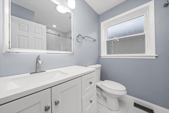 7133 S Honore St, Chicago, IL 60636 - bathroom with vanity, marble look tiles, and a shower