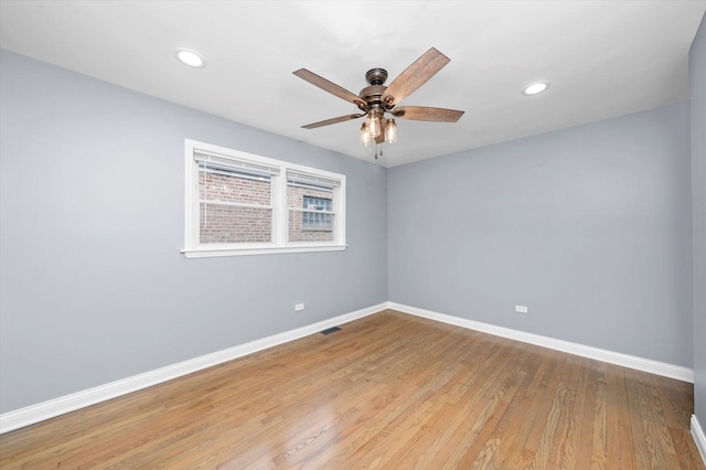 7133 S Honore St, Chicago, IL 60636 - spare room featuring a ceiling fan, wood finished floors, and recessed lighting