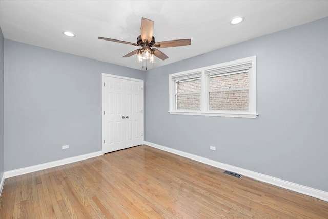 7133 S Honore St, Chicago, IL 60636 - unfurnished room featuring a ceiling fan, recessed lighting, and light wood-type flooring