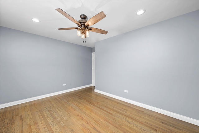 7133 S Honore St, Chicago, IL 60636 - spare room featuring a ceiling fan, light wood-type flooring, and recessed lighting