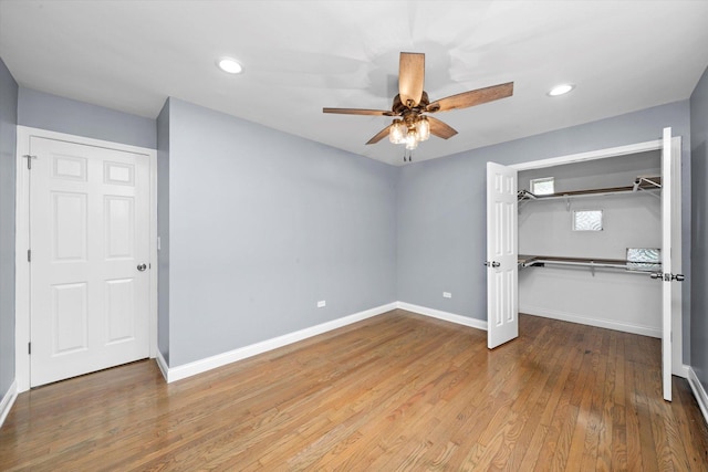 7133 S Honore St, Chicago, IL 60636 - unfurnished bedroom with recessed lighting, a closet, wood finished floors, and a ceiling fan