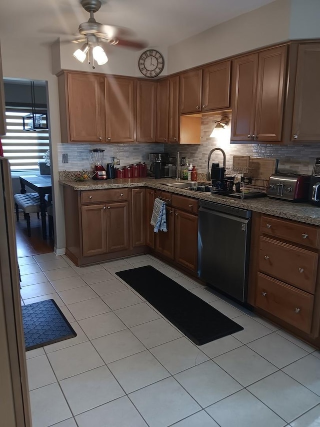 853 Greenbriar Ln, University Park, IL 60484 - kitchen featuring dishwashing machine, light tile patterned floors, a ceiling fan, and tasteful backsplash