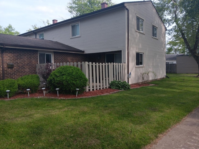 853 Greenbriar Ln, University Park, IL 60484 - back of property featuring a chimney