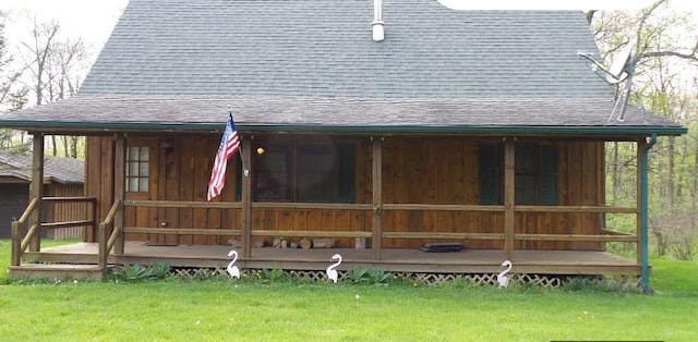 11 Cedar Ln, Putnam, IL 61560 - back of property featuring a shingled roof and a yard